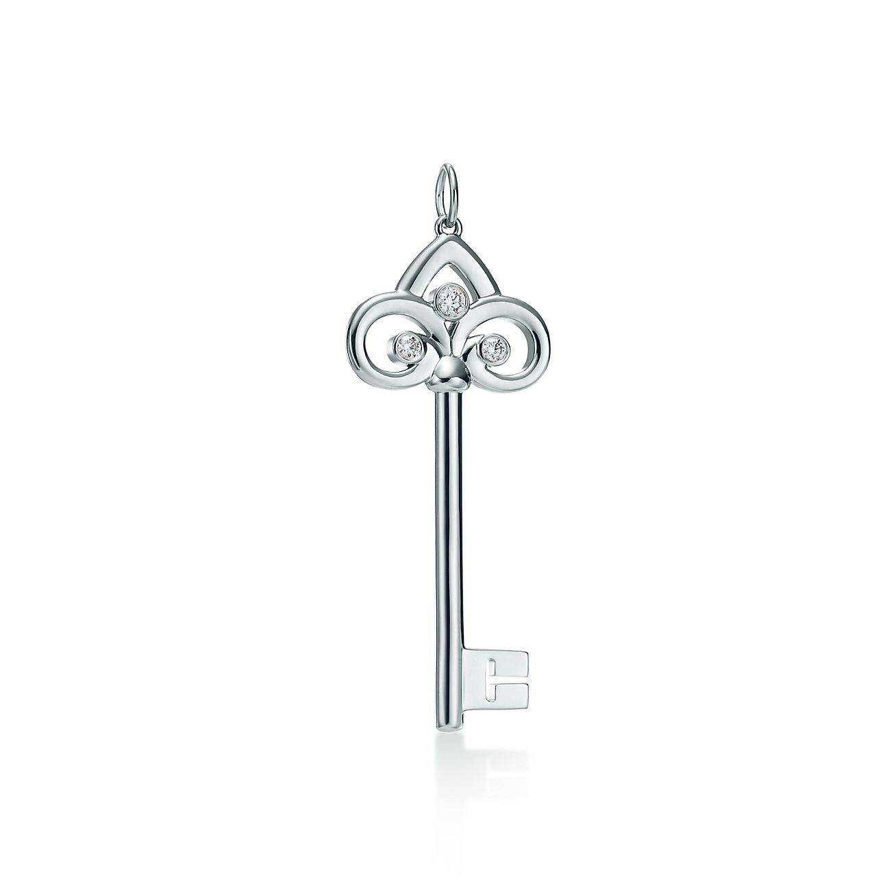 T*f*ny keys fleur de lis key pendant