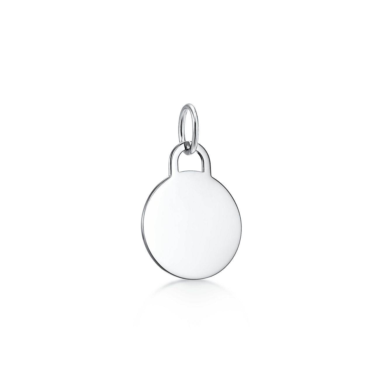 T*f*ny charms round tag charm