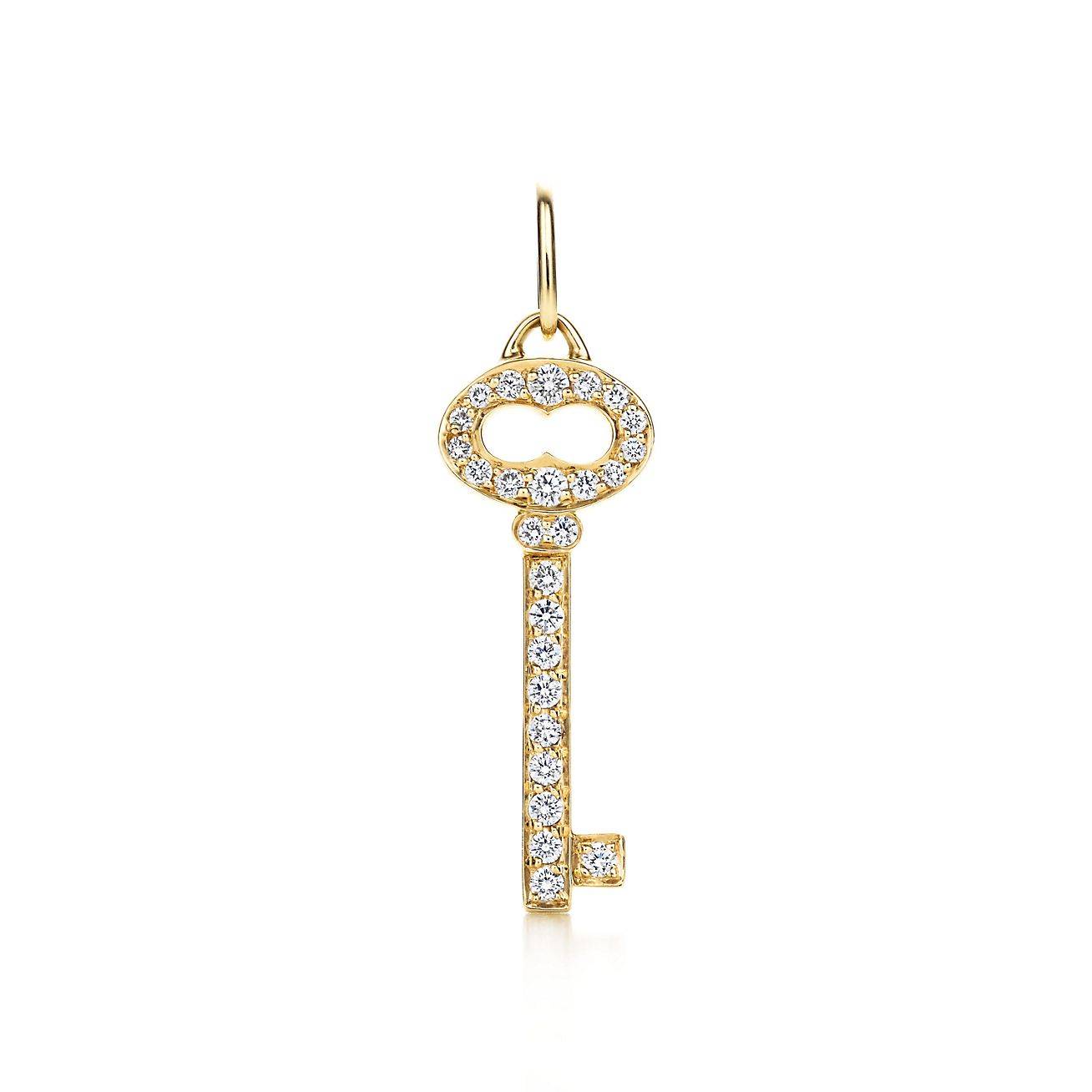 T*f*ny keys vintage oval key charm